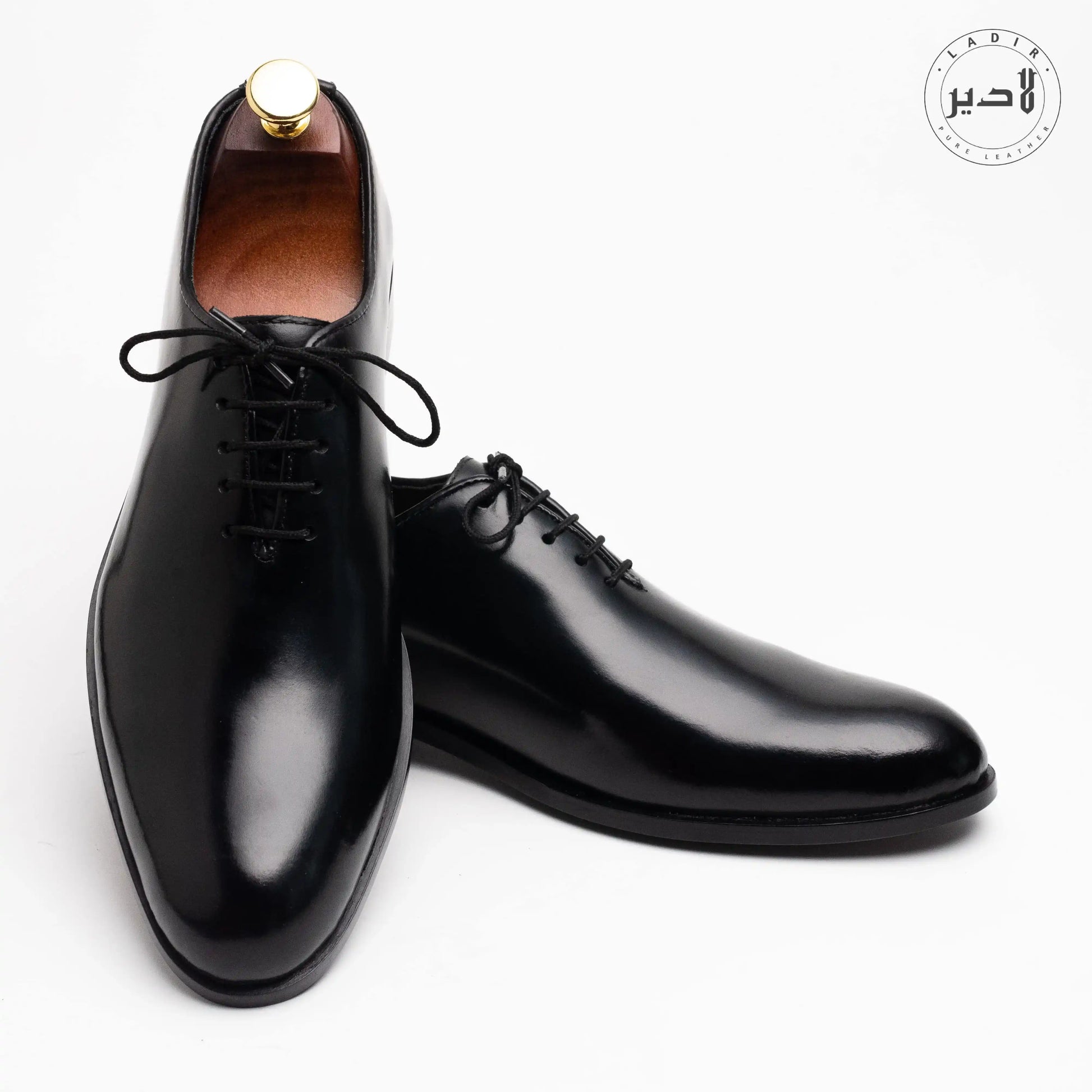 Front view of OXY BLACK formal leather shoes for men, showcasing a sleek, polished black finish and elegant design for formal occasions.
